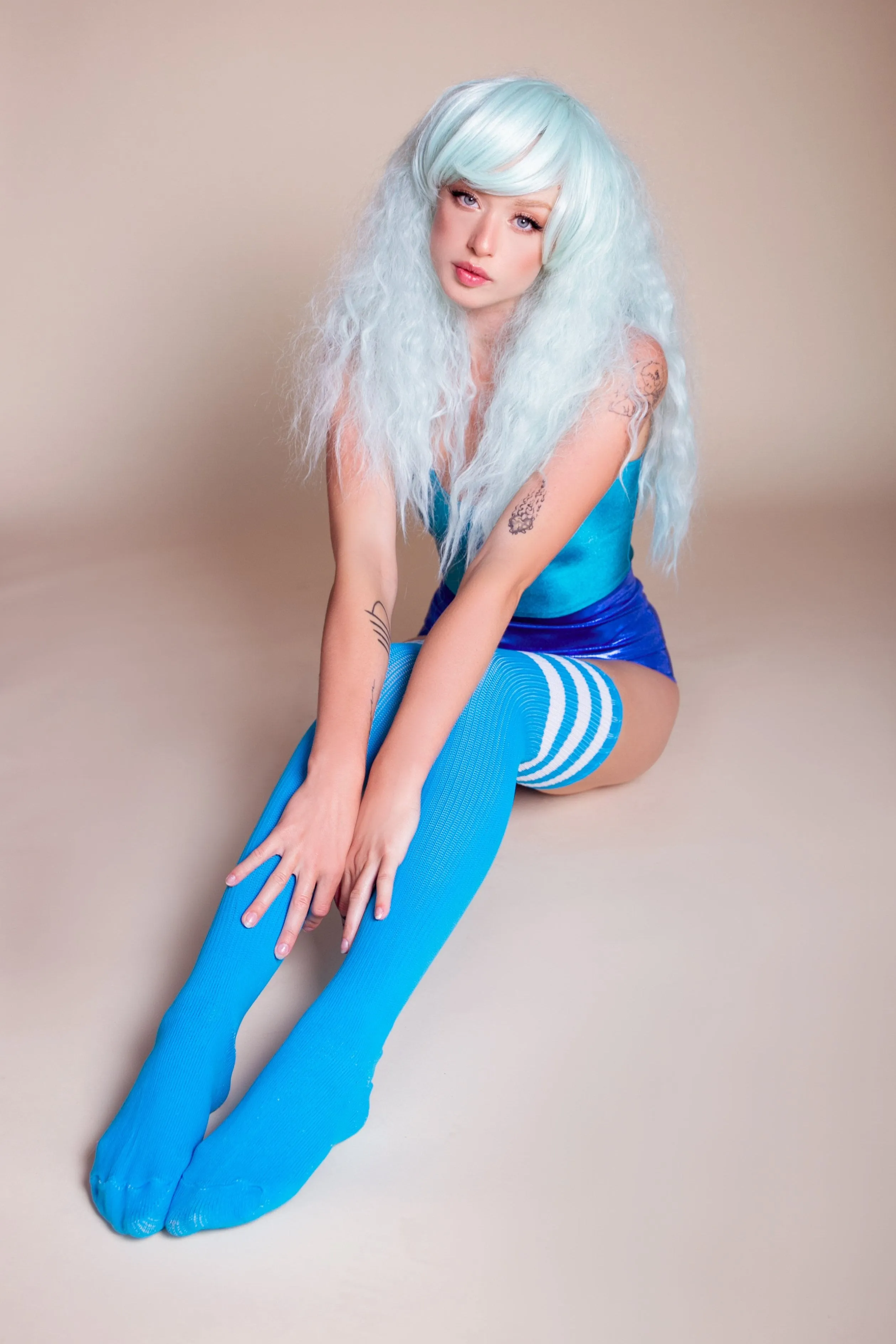 Athletic Thigh High Striped Tube Socks in Neon Blue and White